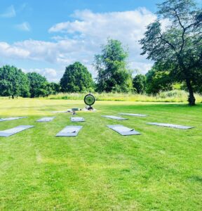 Summer Kundalini yoga class outside YogaSpace Yorkshire Bedale